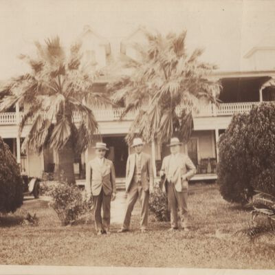 Men standing in front of hotel