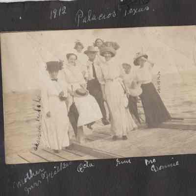 Women posing on pier