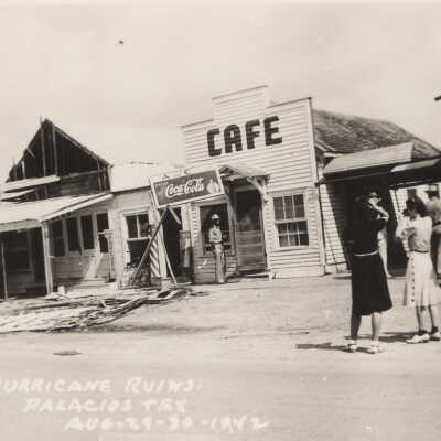 Women standing in front of cafe