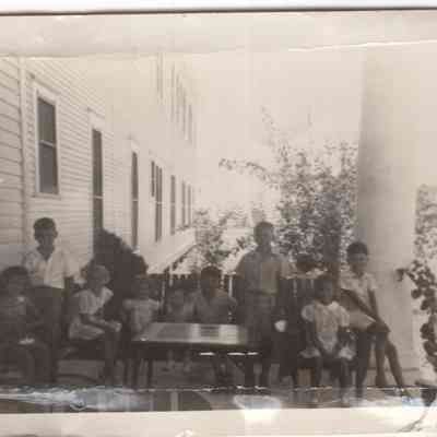 Kids on the Luther Hotel Front Porch