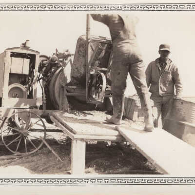 Men creating concrete