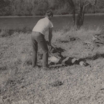 Boy setting up camp