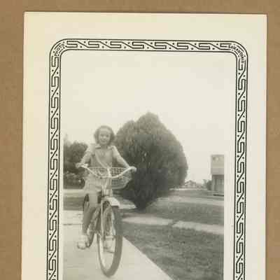 Claire Luther riding bicycle
