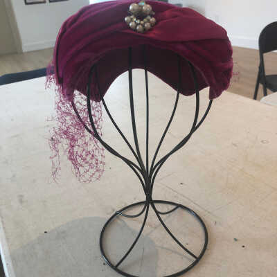 Fuchsia Felt Hat with a Fishnet Veil on the side