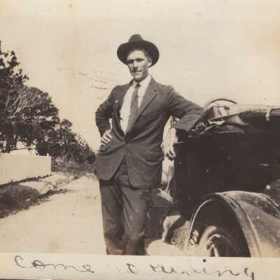 Man leaning against car
