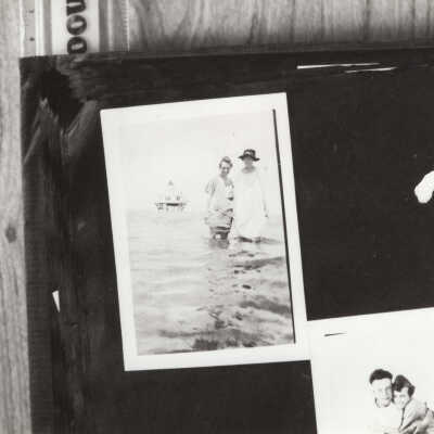 Women standing in front Half-Moon Lighthouse
