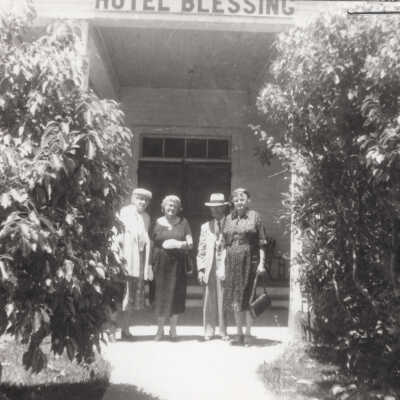 Standing in front of Hotel Blessing