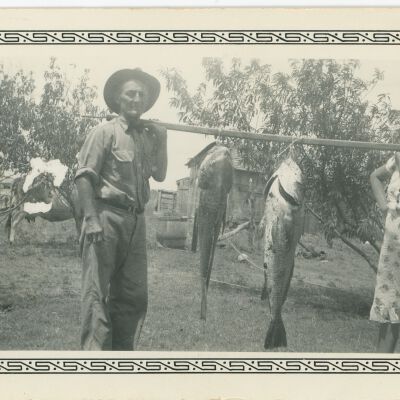 C.L. and Ida Dorsey holding Drum Fish