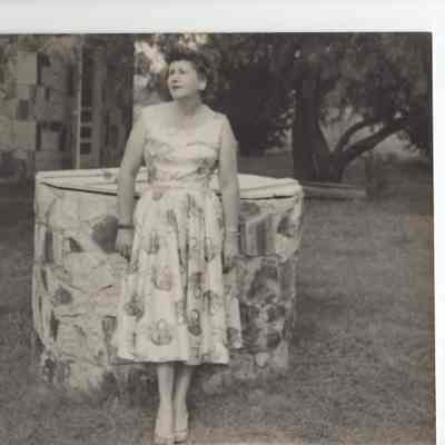 Elsie in front of a well