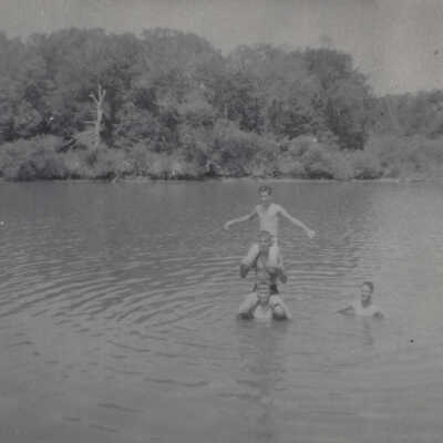 Boys playing in the river