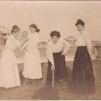 Opal Price yard with 4 ladies & baby