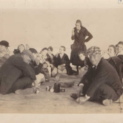 A group playing games on pier