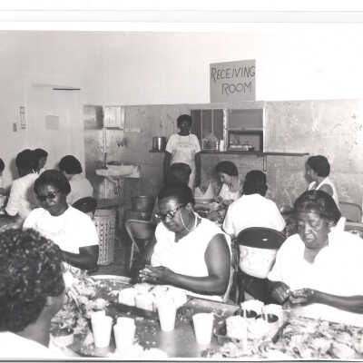 Women packing the crab meat