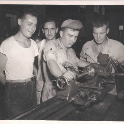 Men Operating Machinery