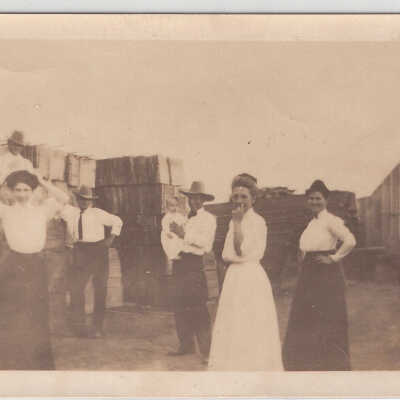 Street scene, People at lumber yard