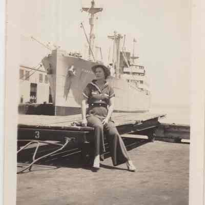 Elsie Luther by a ship