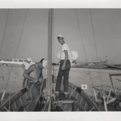 Guys putting up sails