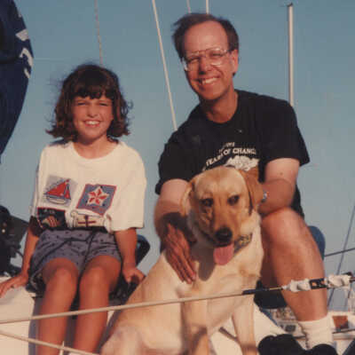 Man, girl, and dog