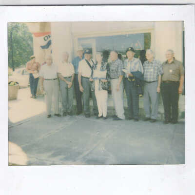 Men standing in front of Museum