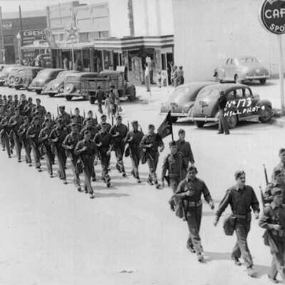 Soldiers marching on Main Street