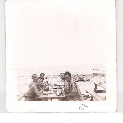 Men at Picnic Tables