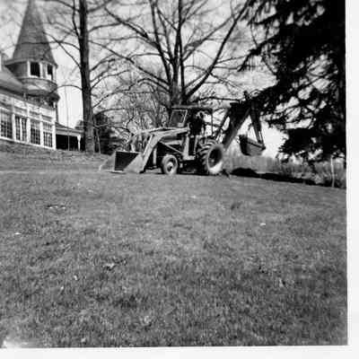 Preparing the grade for the right-of-way in front of the mansion, 1960