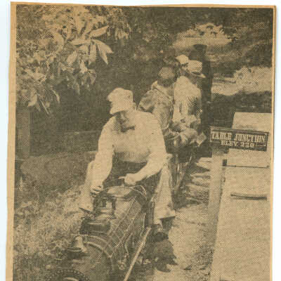 T. Clarence Marshall as engineer of loaded passenger train