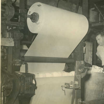 Parker Baldwin operating the Crowell Tape Mill laminator