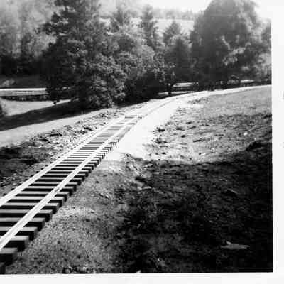 Installed railroad sections at the front of the property, 1960