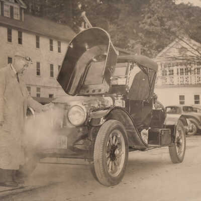 1948 Glidden Tour - Earle Eckel with steam car at Bedford Springs, PA, 1948
