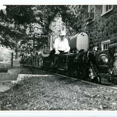 T. Clarence Marshall conducting train
