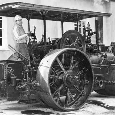 1972 Weldin Stumpf operating the steam roller at Magic Age of Steam
