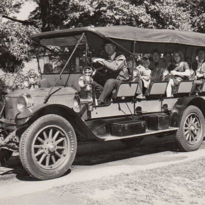 Thomas C Marshall, Jr driving the 1915 Stanley Model 820 Mountain Wagon full of passengers at the Magic Age of Steam, about 1973