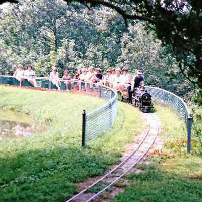 Engine 402 being operated by Larry Jensen near the pond at the Magic Age of Steam, 1973