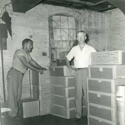 John Brackin with Crowell Tape finished product cartons
