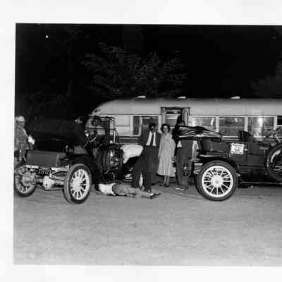 1949 Glidden Tour - cars being repaired with the "fix-it" bus in the background