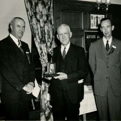 1951 Glidden Tour - T Clarence Marshall, Sr., receiving first prize trophy