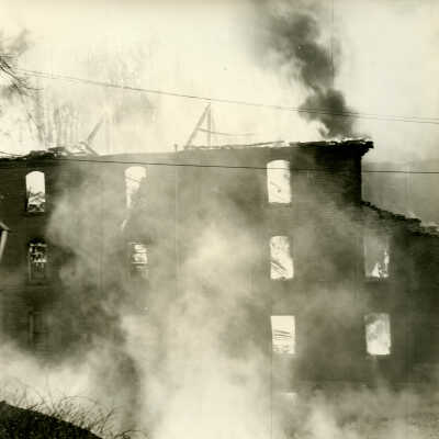 Crowell Tape Mill on fire, 1964