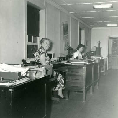 Jeanette Henter and colleague in the Crowell Tape Mill office