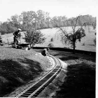 Finished railroad on the front lawn, 1960