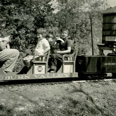 Kids riding steam train at the Magic Age of Steam, 1963