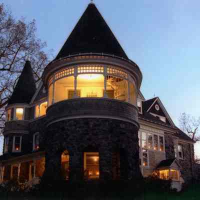 2005 - mansion lighted at an evening event in the fall