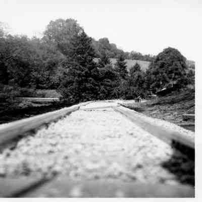Track being leveled on the front lawn, 1960