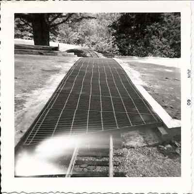 New track at the front gate crossing with grate, 1960