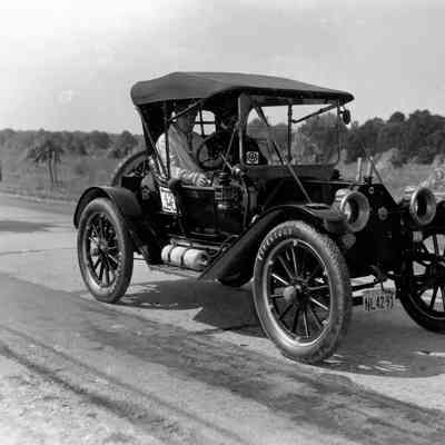 1949 Glidden Tour - Leo Peters and passenger in a 1912 Buick