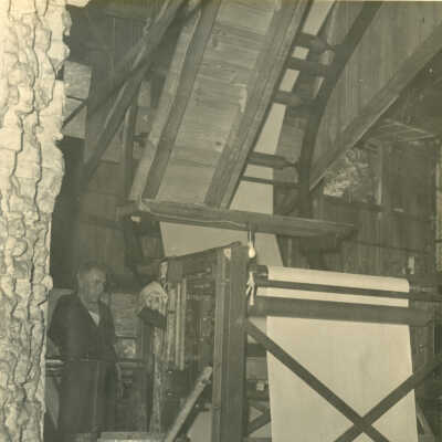 Crowell Tape Mill paper web with worker
