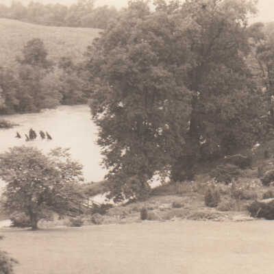 Red Clay Creek flooding below Auburn Heights rock garden and mill race footbridge, 1938