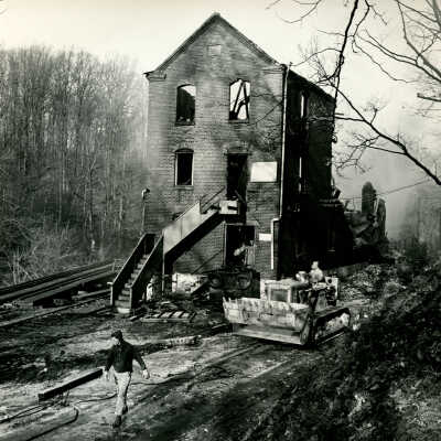 Clean-up after the Crowell Tape Mill fire, 1964 or 1965
