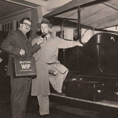 Thomas C Marshall Jr being interviewed by Gene M Milner of WIP with the 1913 Stanley Model 76, 1957