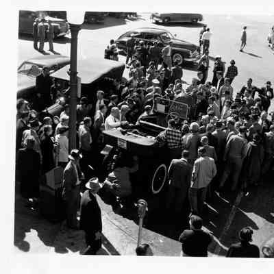 1949 Glidden Tour - crowd surrounding Thomas C. Marshall, Jr. and his 1914 Stanley Model 607